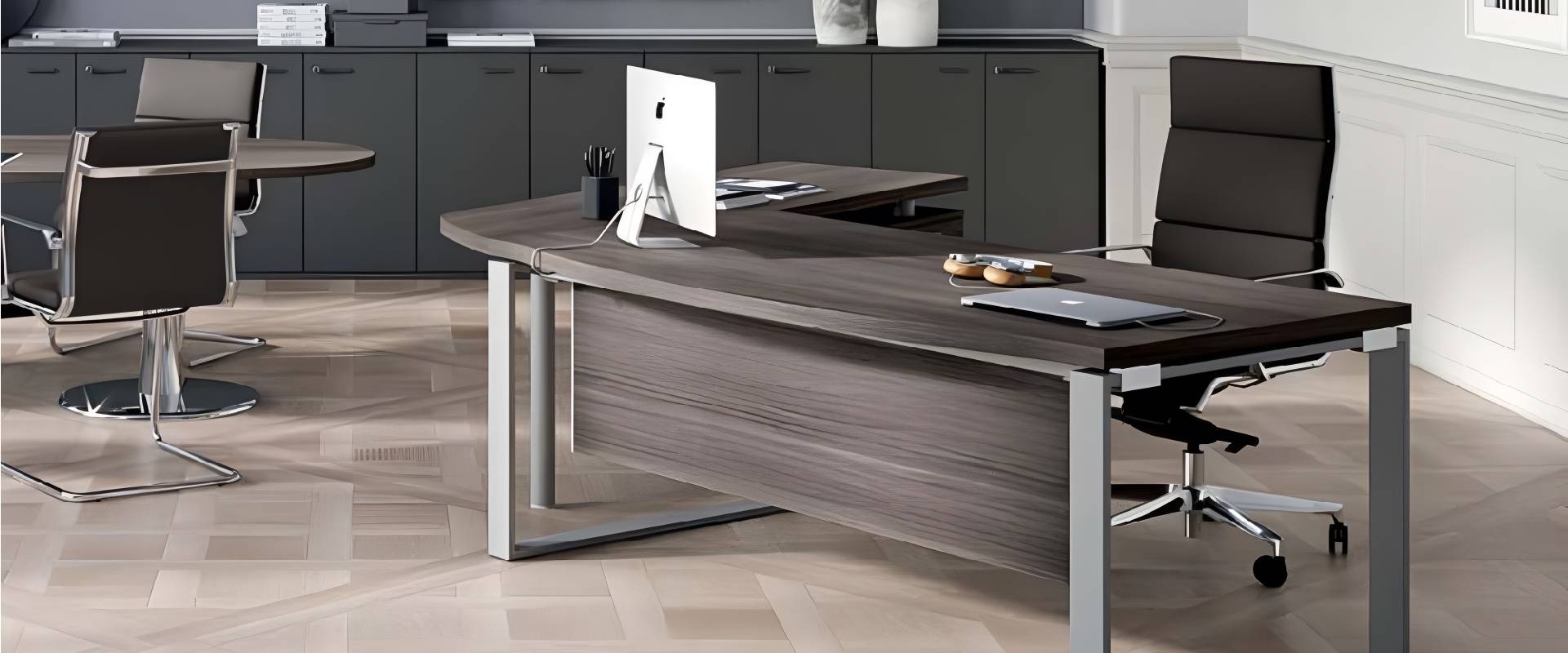 Contemporary executive office featuring a dark wood executive desk, ergonomic leather office chairs, meeting table, storage cabinets, and a modern professional workspace.