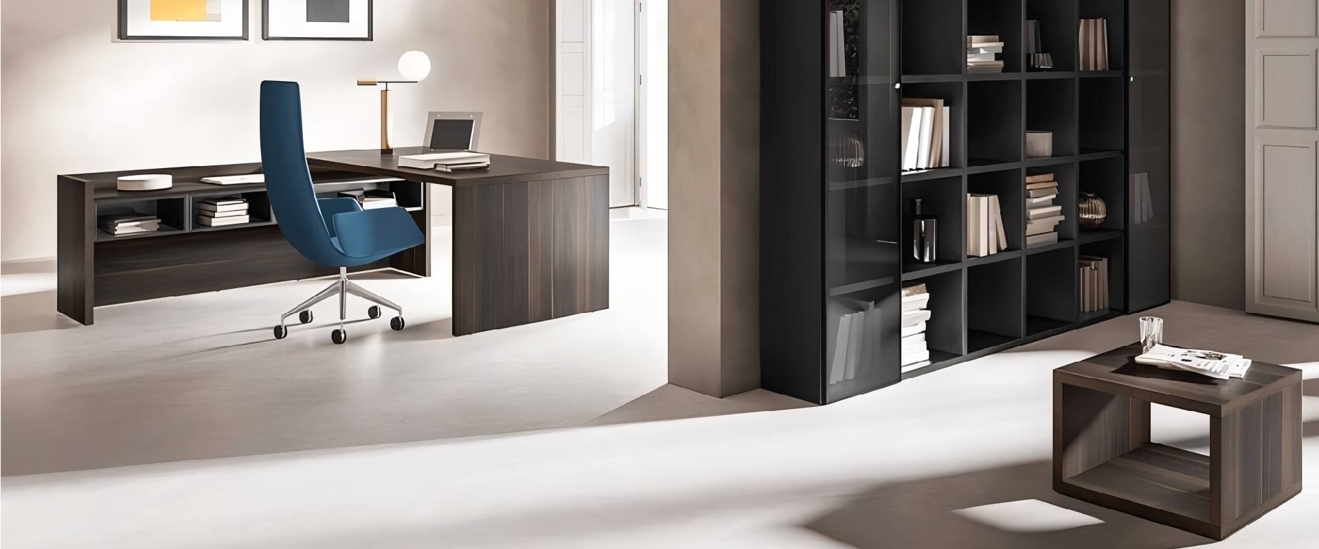 Bespoke executive office desk with wood finish, integrated storage cabinets and ergonomic workspace in a modern office.
