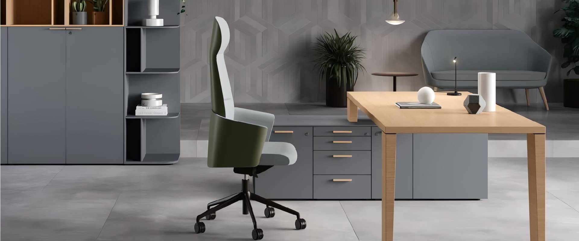 Modern executive office with a wooden desk, ergonomic office chair, grey storage cabinets, built-in drawers, and contemporary lounge seating in a minimalist workspace.