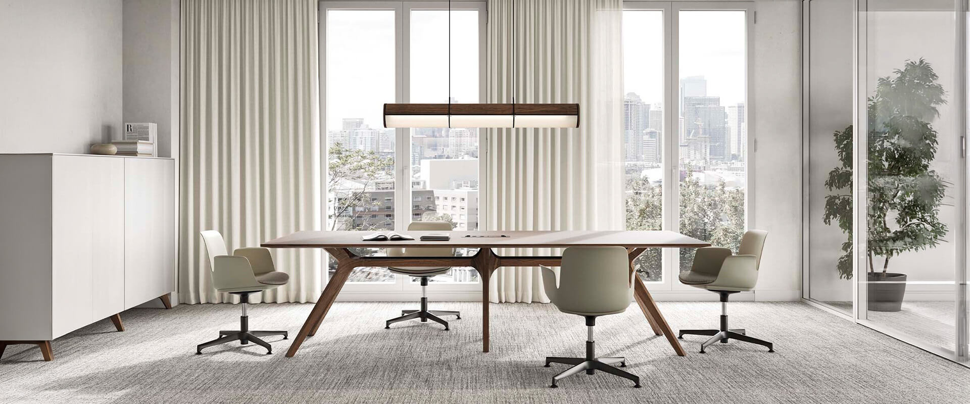 Modern meeting room furniture featuring a premium conference table, meeting chairs, and elegant commercial office interior design for collaborative workspaces.
